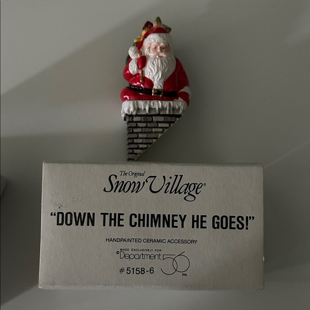 Department 56 “Down the Chimney He Goes”